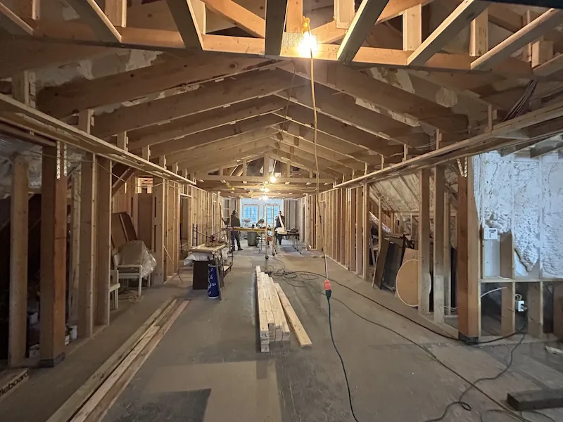 New wall and ceiling framing inside a residential property