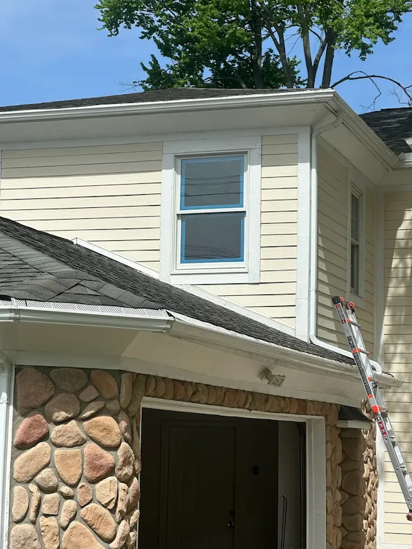 Finished window, siding, and exterior trim on a home