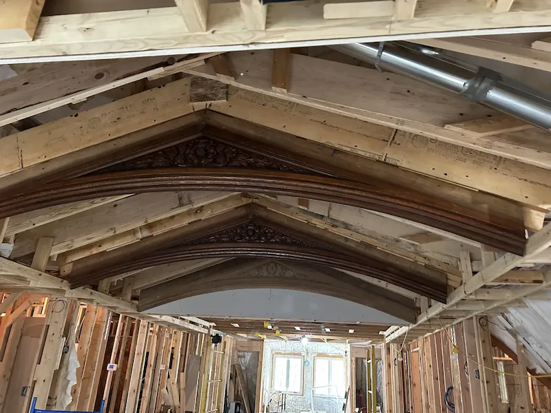 Detailed wood ceiling framing during an interior renovation